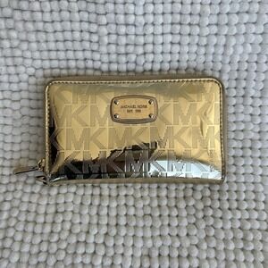 Michael Kors Jet Set Travel Continental Wallet Metallic Gold MK Logo Debossed